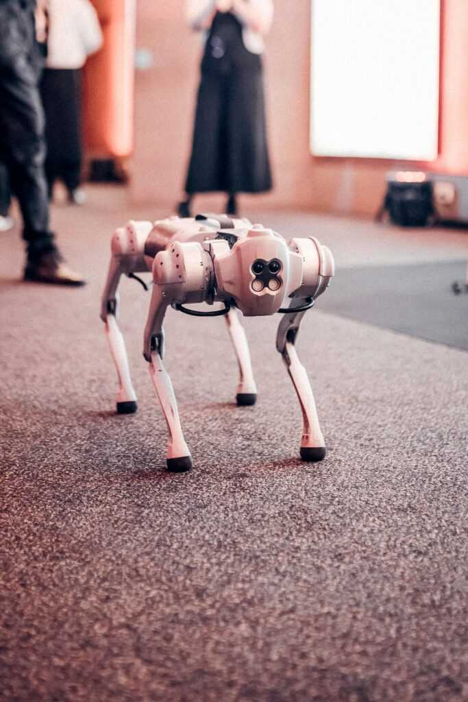 Robotic dog displayed at a tech event showcasing innovative technology.