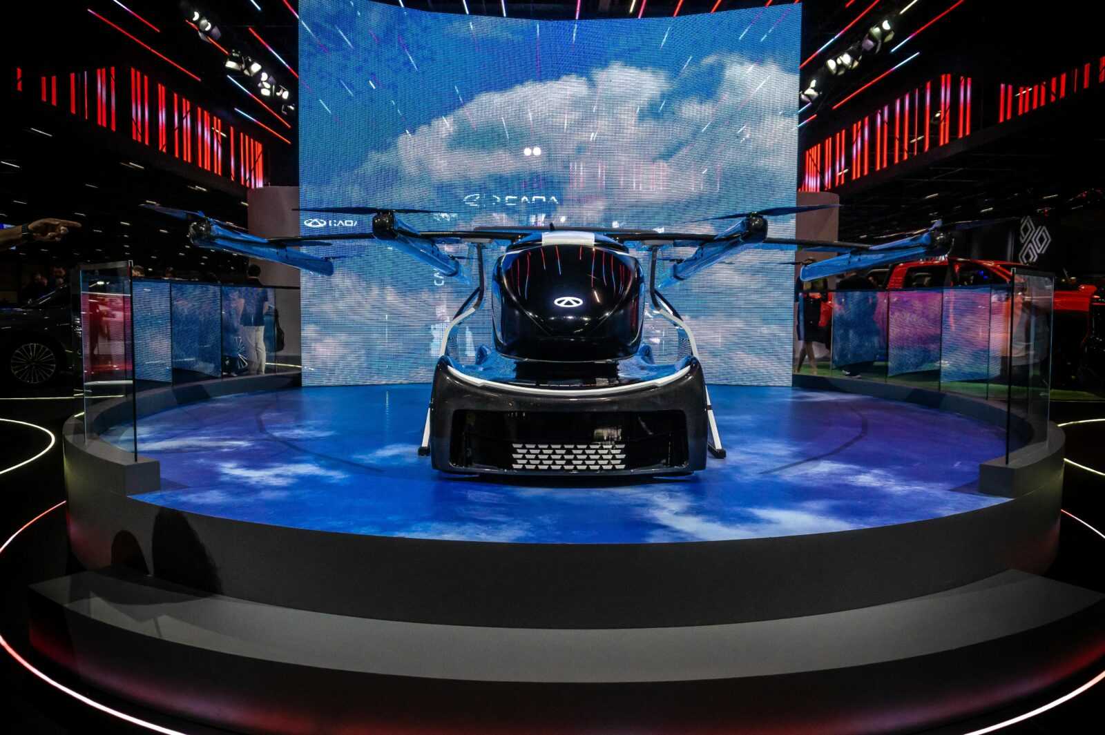 Flying car exhibit at automotive event in São Paulo showcasing innovation in transport technology.